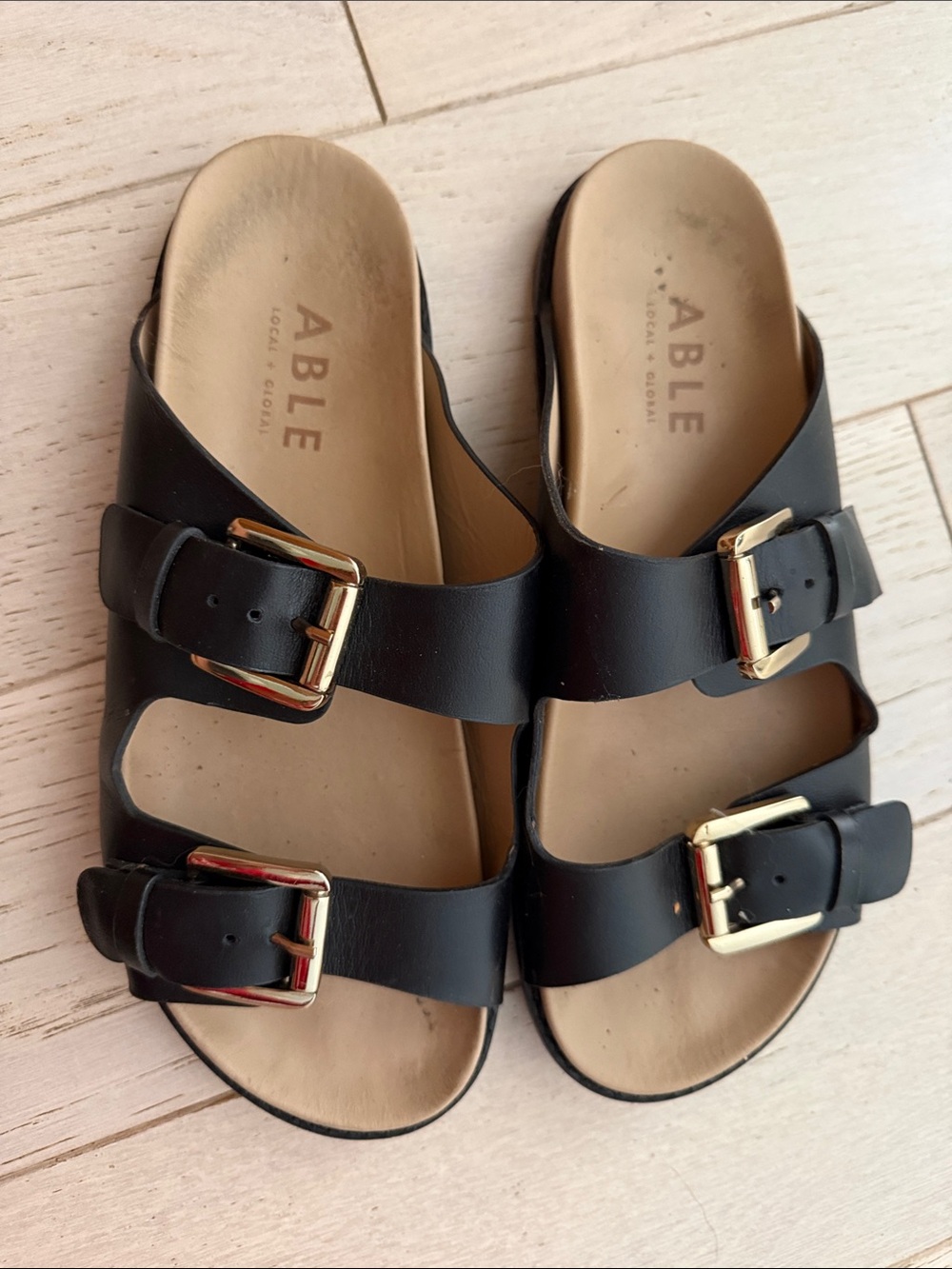 ABLE Black Leather Double-Buckle Slide Sandals with Gold Buckles